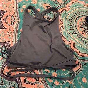 Super cute blue crop back less and has straps